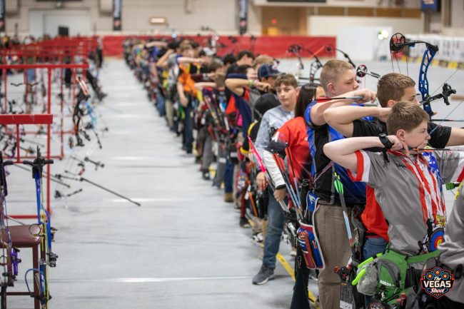 Kids competing Archery
